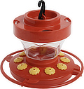 First Nature 16oz clear plastic humminbird feeder with built-in ant moat on top ... at Amazon